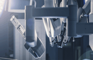 This is an Adobe Stock image of robotic surgery arms to go along with a story with highlights from MassDevice's Medtech Market Intelligence Report about the global surgical robotics market.