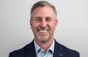 Headshot image of Distalmotion CEO Greg Roche