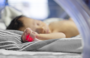 Masimo SET Pulse Oximetry critically ill neonate newborn