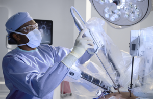 Johnson & Johnson surgeon loading Ottava instrument