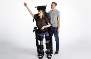 This is a Wandercraft marketing image that shows the self-balancing Eve allowing the wearer to stand hands-free.