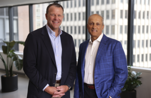 This is a photo from Stryker that shows incoming CEO Spencer Stiles on the right and on the left Kevin Lobo who will transition from CEO to executive chair of the board of directors.