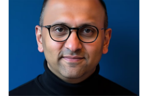This is a portrait photo of Karthik Ganesh who is the CEO of OnMed.